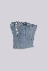 Strapless corset silhouette denim tube top designed to jeans waistband with decorative front buttons, Vertical seam paneling that structures the bodice