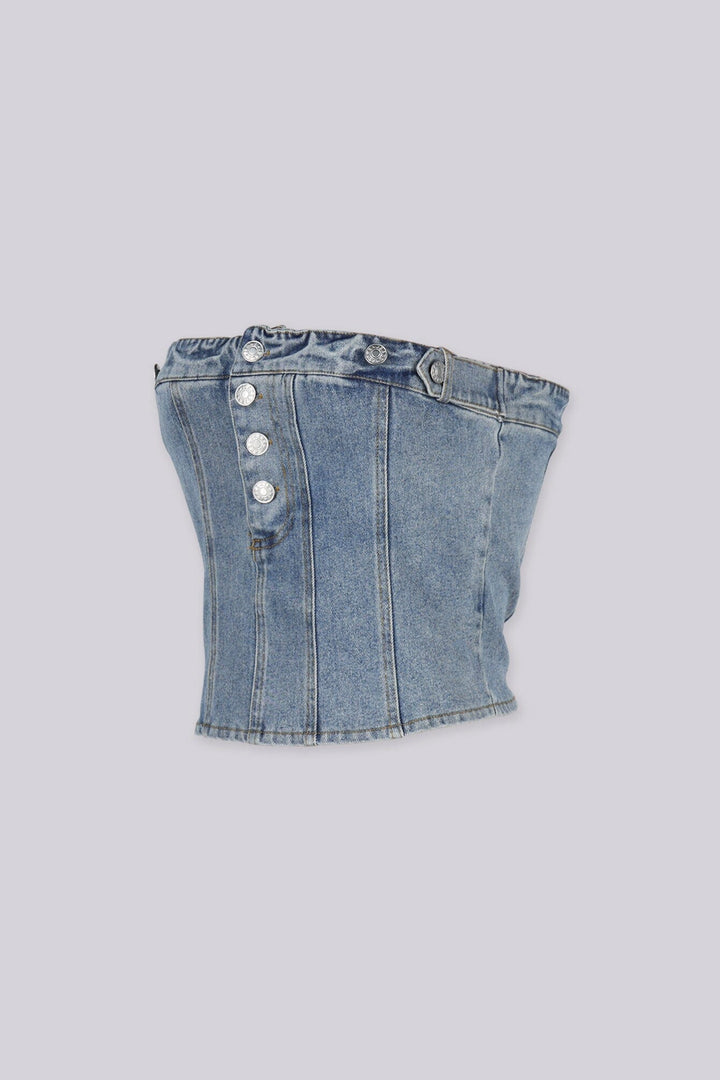 Strapless corset silhouette denim tube top designed to jeans waistband with decorative front buttons, Vertical seam paneling that structures the bodice