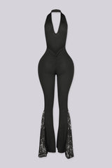 Ribbed knit fitted halter jumpsuit with a plunging V neckline and open low back, back view