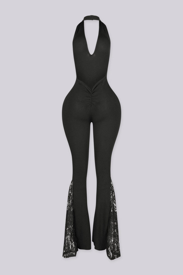 Ribbed knit fitted halter jumpsuit with a plunging V neckline and open low back, back view