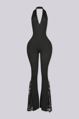 Ribbed knit fitted halter jumpsuit with a plunging V neckline and open low back, front view