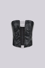 Faux leather fitted corset top featuring center front cutout with horizontal corded straps
