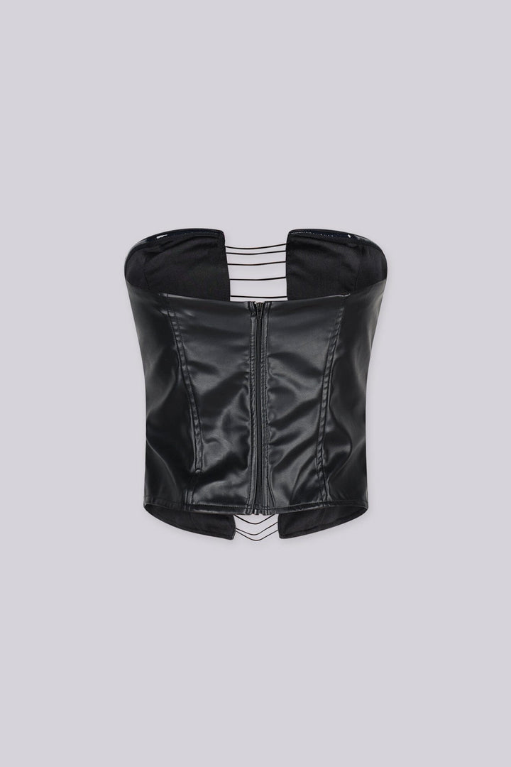 Faux leather fitted corset top featuring center front cutout with horizontal corded straps