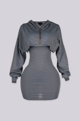 Stripped fitted mini tank dress with adjustable spaghetti straps and bow detail