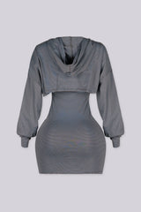 Stripped fitted mini tank dress with adjustable spaghetti straps and bow detail