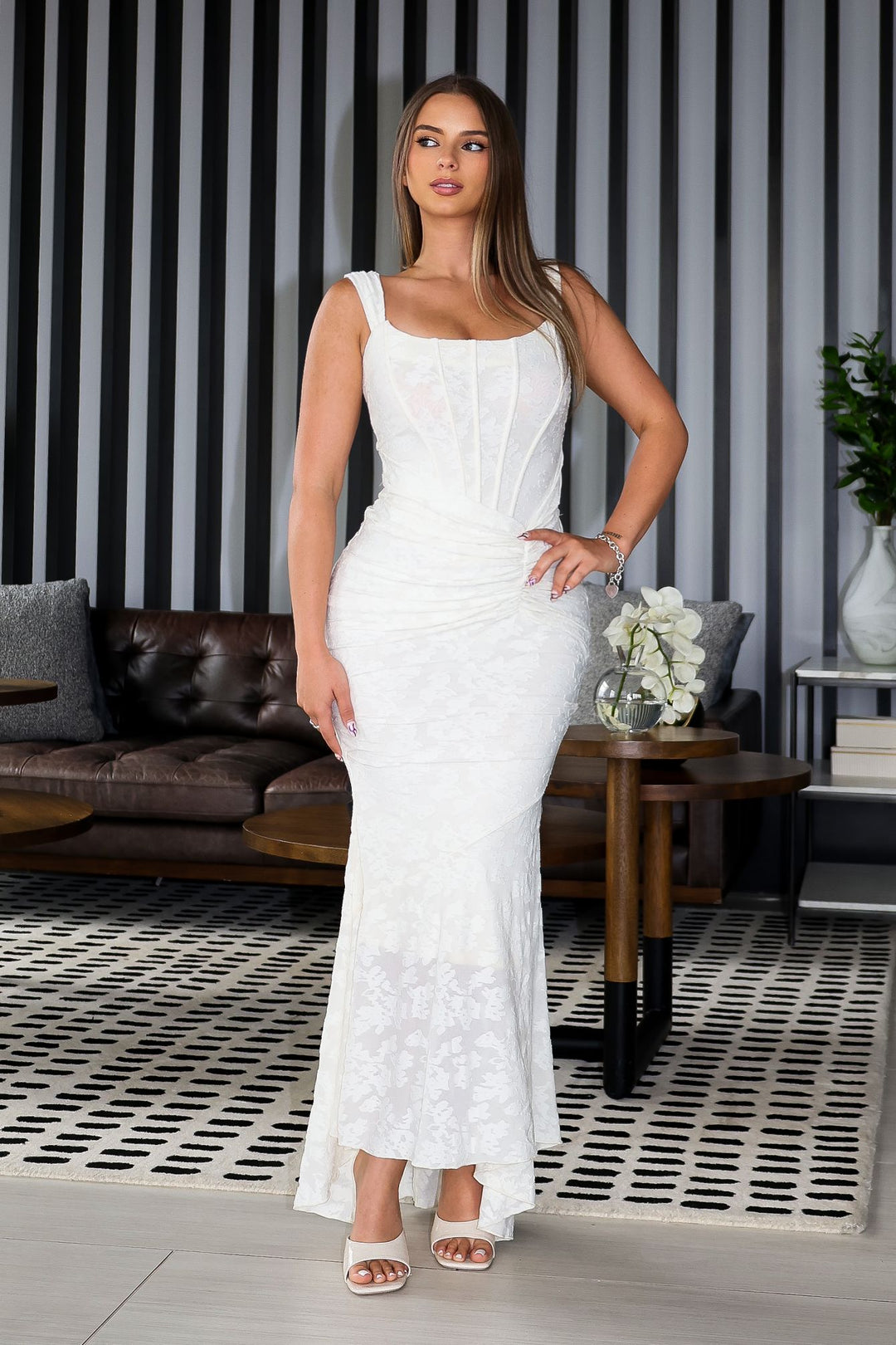 Mermaid corset maxi dress featuring a textured floral lace, Scooped square neckline and supportive straps