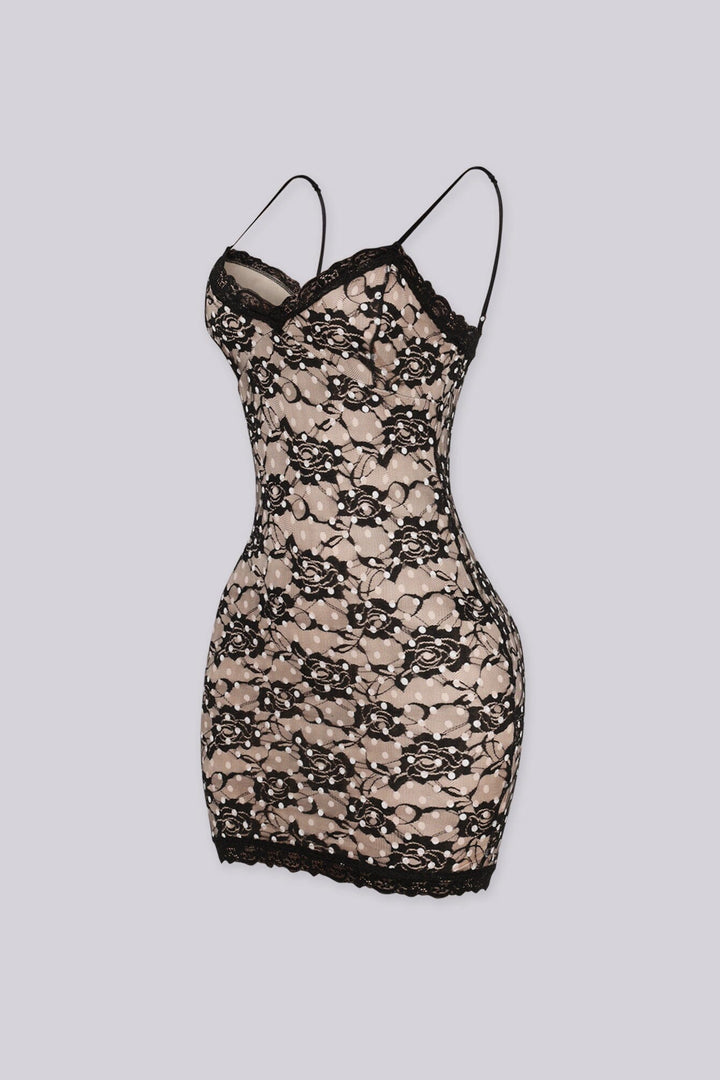 Bodycon mini dress featuring nude lining overlayed with black floral lace and white polka dot detailing