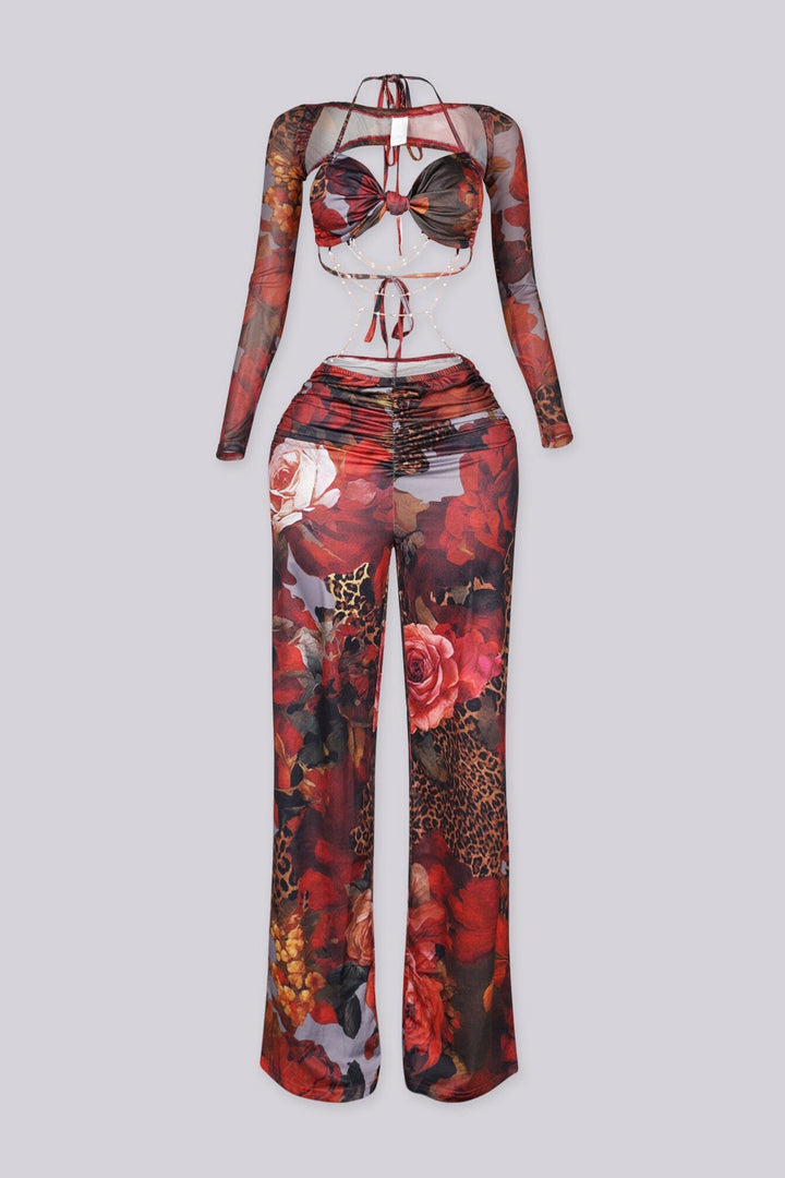 Mesh jumpsuit of vibrant floral and leopard prints featuring body-sculpting ruched bodice with detachable sheer bolero