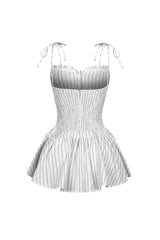 Linen pinstriped corset mini dress featuring ruched sweetheart cups with frill rim detail
Drop waist hemline with flared mini peplum skirt