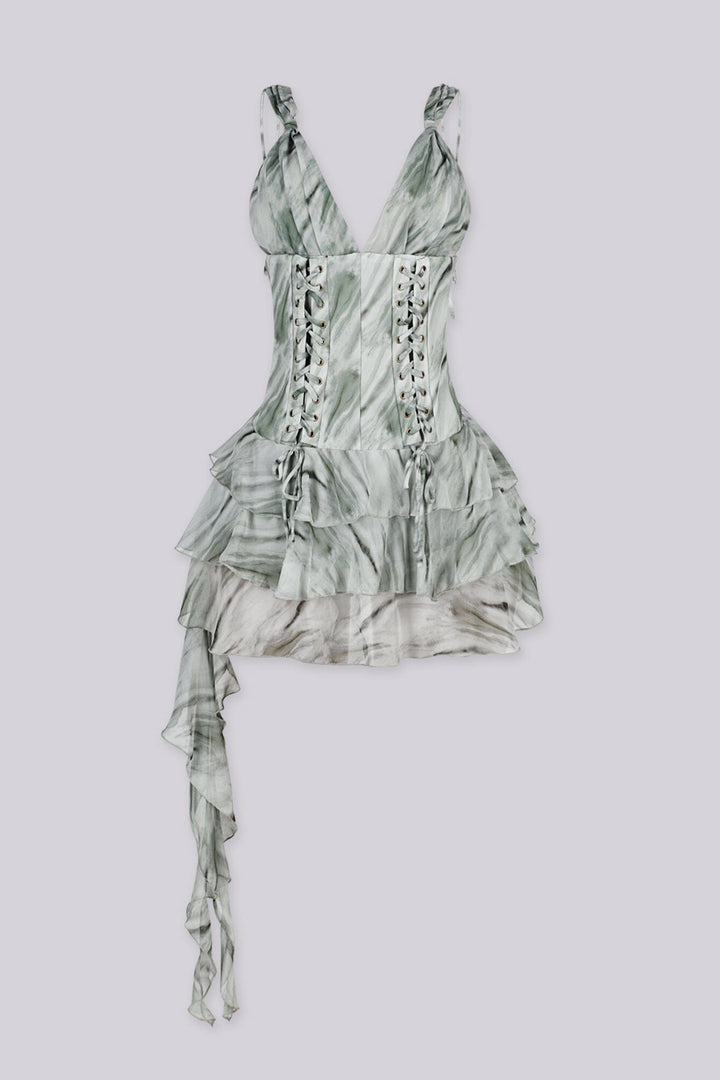 Deep plunging v neckline dress featuring double corset style lace-up detailing, Back side stretchy smocked center panel for contouring fit, Asymmetrical ruffle mini skirt with a ruffle sash hanging from one side