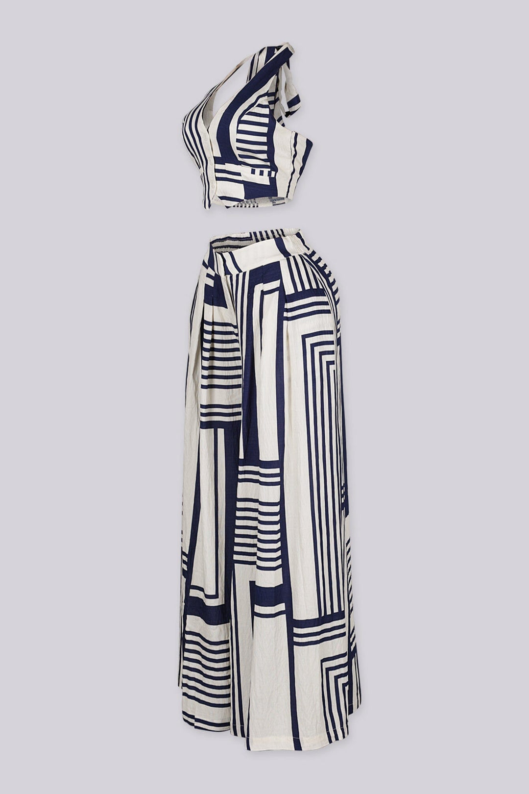 Halter neck cropped vest top with deep V front and open back tie neck detail
High waisted wide leg pants featuring deep front pleats with wide elastic waistband