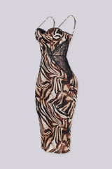 Sultry printed mesh midi dress with sheer lace side panels, side view.