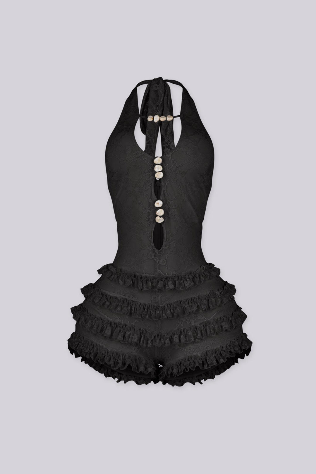 Fitted bodice halter romper with deep V neckline featuring vertical teardrop keyhole cutout and seashell beads embellishments
Micro mini shorts featuring overlaid with horizontal tiers of ruffle detailing