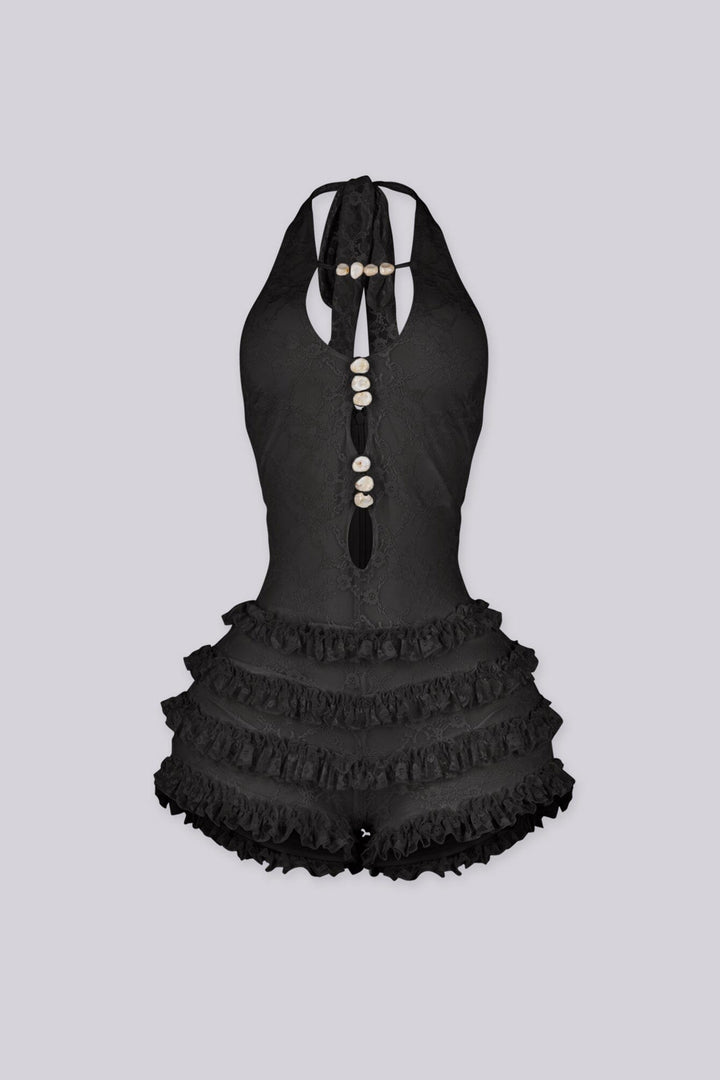 Fitted bodice halter romper with deep V neckline featuring vertical teardrop keyhole cutout and seashell beads embellishments
Micro mini shorts featuring overlaid with horizontal tiers of ruffle detailing