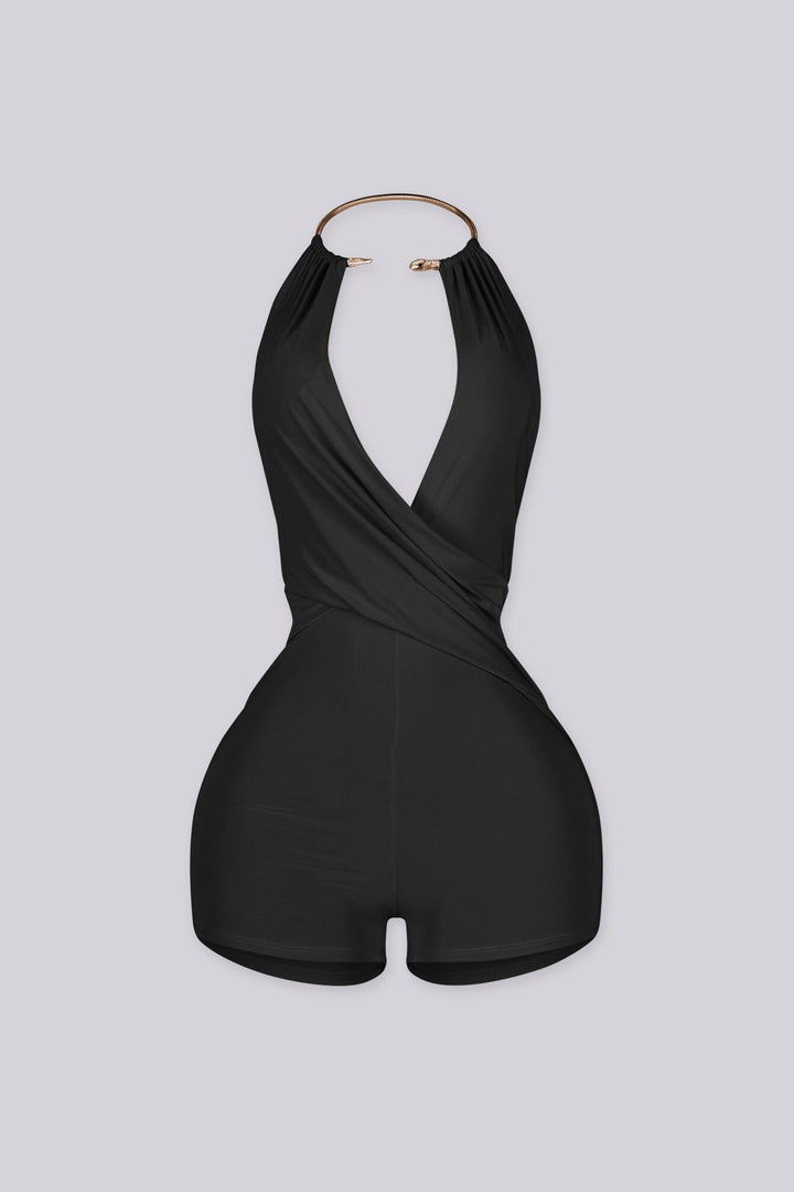 Deep plunging halter romper with snake rhinestone choker detailing
Ruched front with adjustable drawstring and sculpted bodycon fit
