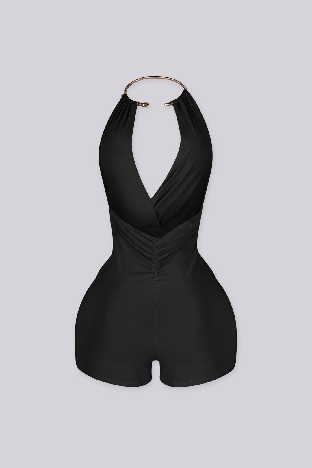 Deep plunging halter romper with snake rhinestone choker detailing
Ruched front with adjustable drawstring and sculpted bodycon fit
