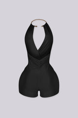 Deep plunging halter romper with snake rhinestone choker detailing
Ruched front with adjustable drawstring and sculpted bodycon fit