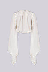 Sheer chiffon deep plunging wrap blouse with a tie closure at the waist