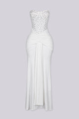 Strapless maxi gown with scattered crystal and rhinestone embellishment throughout the bodice