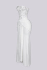 Strapless maxi gown with scattered crystal and rhinestone embellishment throughout the bodice