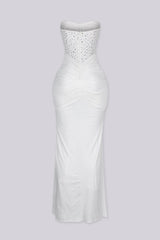 Strapless maxi gown with scattered crystal and rhinestone embellishment throughout the bodice