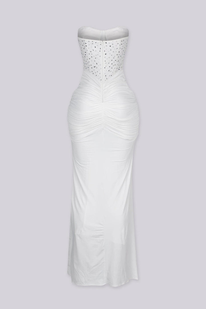 Strapless maxi gown with scattered crystal and rhinestone embellishment throughout the bodice