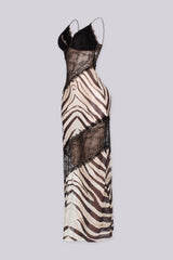 Animal print maxi slip dress featuring V neckline with spaghetti straps and sheer black lace spliced paneling