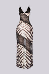 Animal print maxi slip dress featuring V neckline with spaghetti straps and sheer black lace spliced paneling