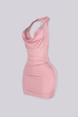 Soft cowl neckline mini dress with a silky drape that falls naturally
Open back halter design with O-ring chain detail for a bold finish