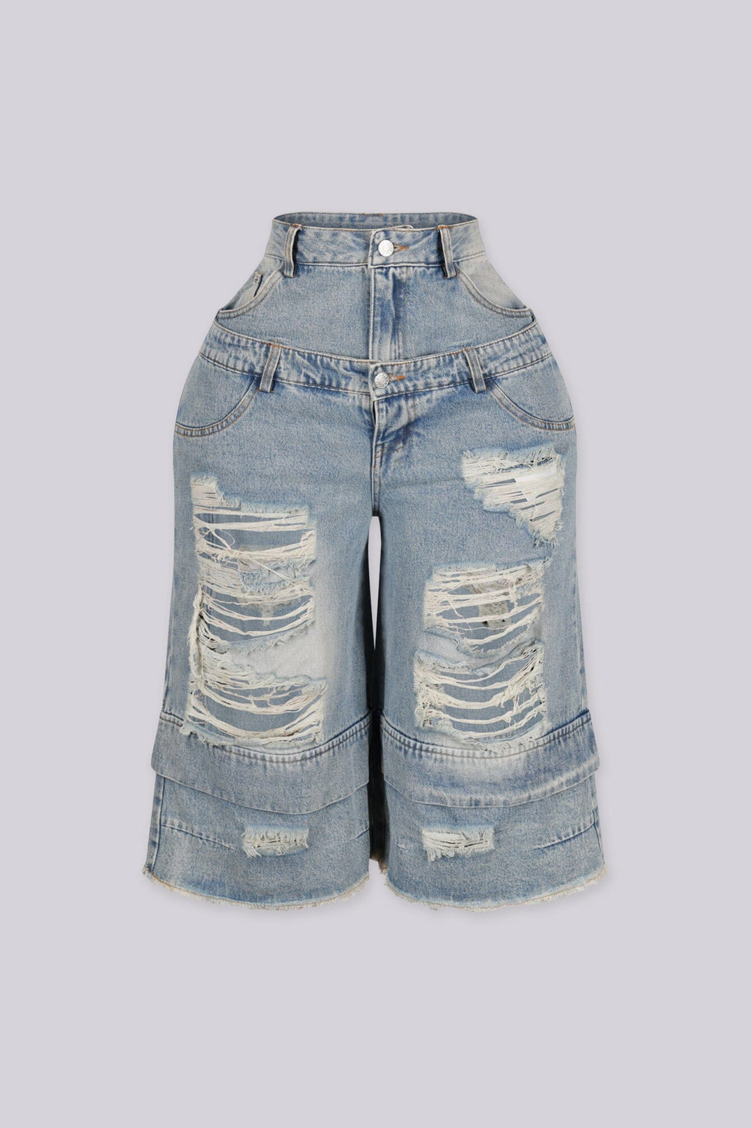High rise wide leg bermuda denim shorts with distressed rips and frayed patches, front view