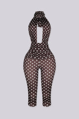 Polka dot pattern high halter neck jumpsuit with a keyhole cutout at the front chest