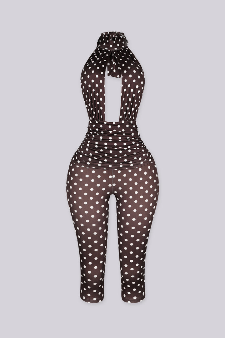 Polka dot pattern high halter neck jumpsuit with a keyhole cutout at the front chest