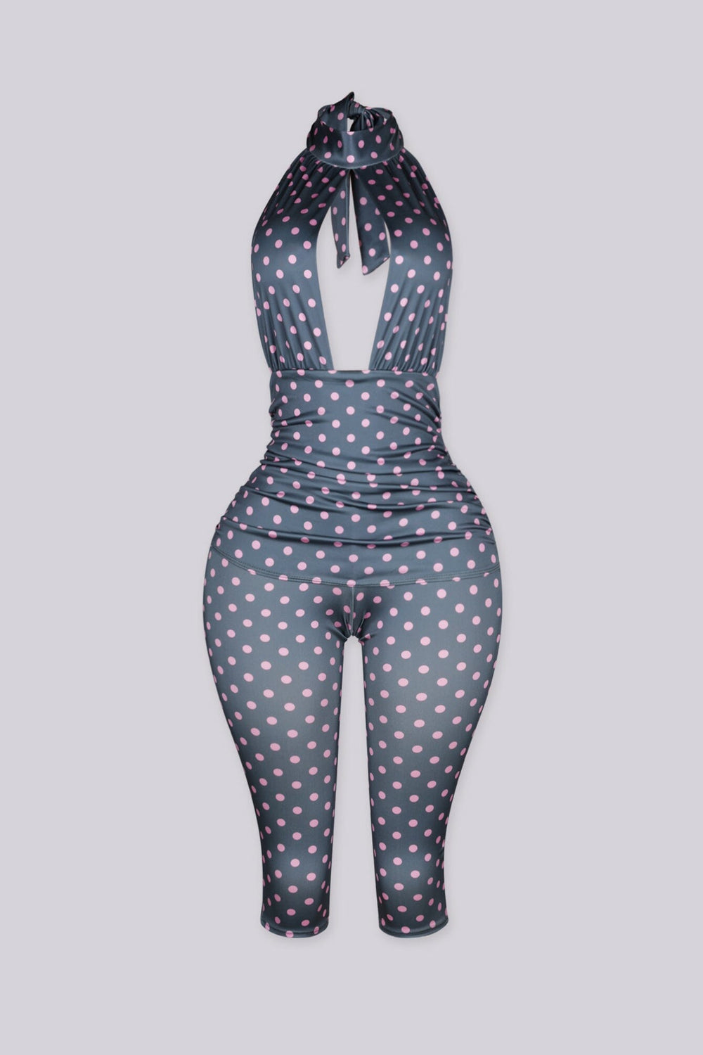 Polka dot pattern high halter neck jumpsuit with a keyhole cutout at the front chest