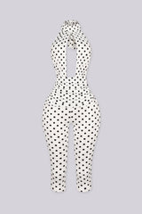 Polka dot pattern high halter neck jumpsuit with a keyhole cutout at the front chest
