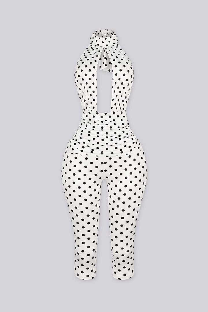 Polka dot pattern high halter neck jumpsuit with a keyhole cutout at the front chest
