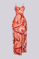 Abstract swirl print maxi dress featuring ruched sweetheart neckline, Asymmetrical tiered ruffle with side tie detail at waist