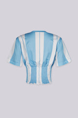 Vertical stripes short sleeve graphic crop top featuring a cinched smocked waist