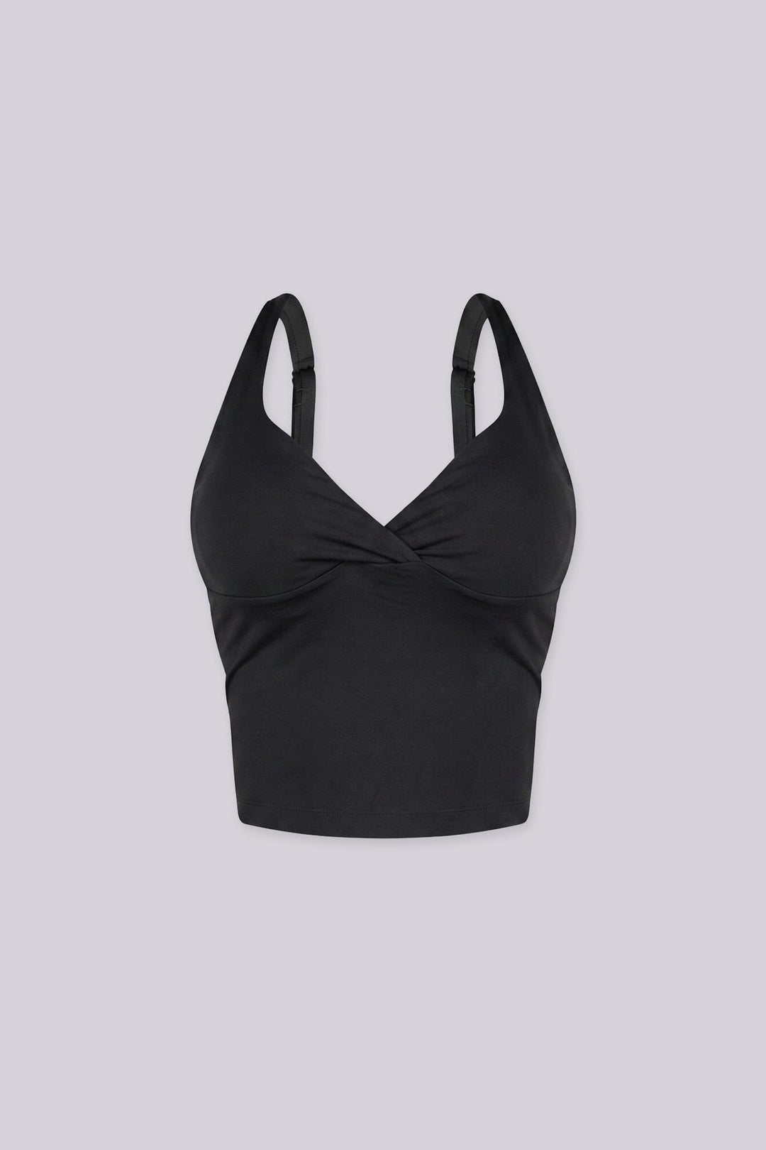 Cropped tank top featuring a flattering sweetheart neckline and padded bustier with adjustable straps