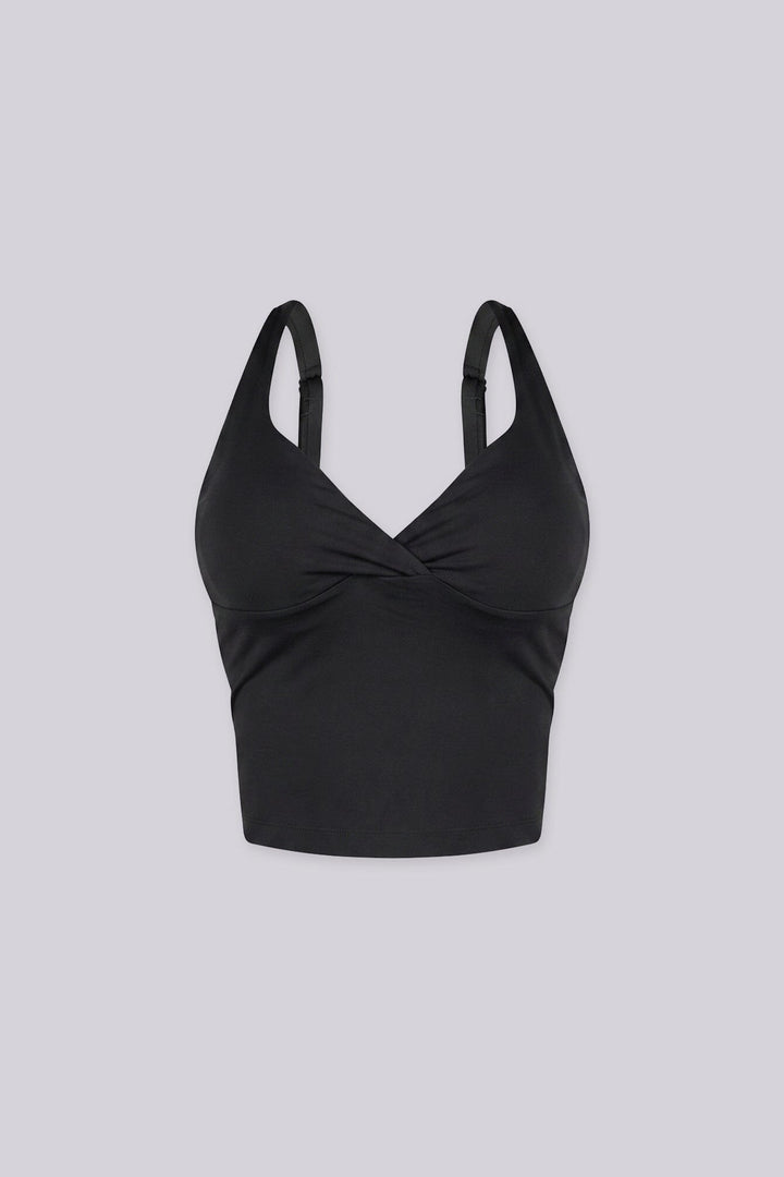 Cropped tank top featuring a flattering sweetheart neckline and padded bustier with adjustable straps