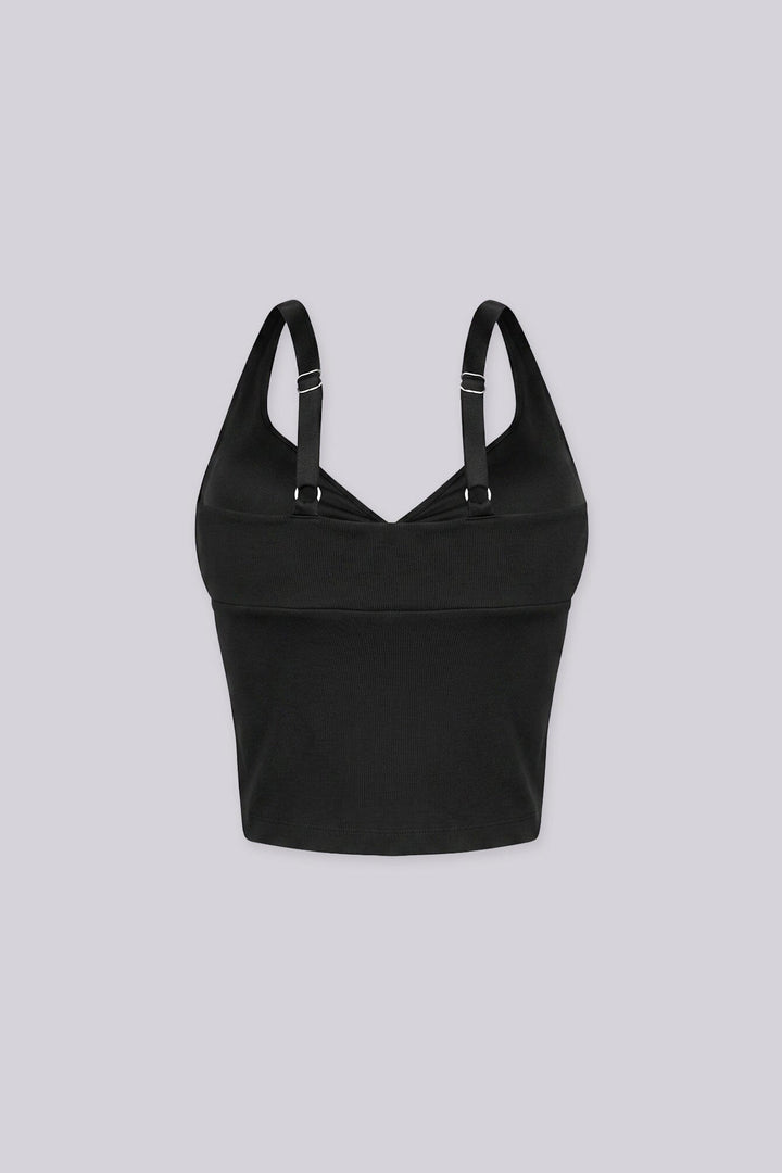 Cropped tank top featuring a flattering sweetheart neckline and padded bustier with adjustable straps