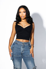 Cropped tank top featuring a flattering sweetheart neckline and padded bustier with adjustable straps