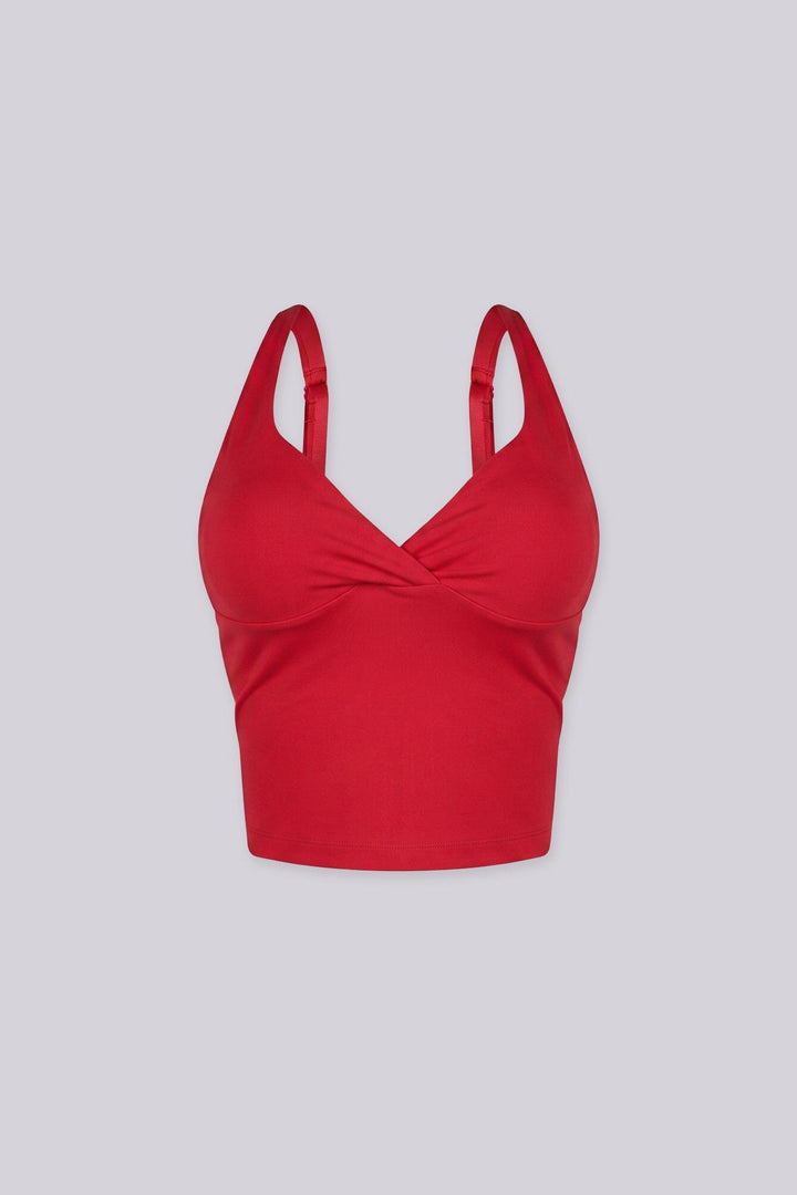 Cropped tank top featuring a flattering sweetheart neckline and padded bustier with adjustable straps