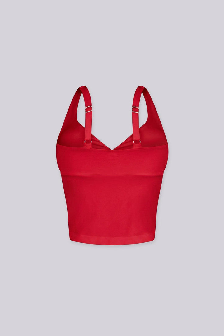 Cropped tank top featuring a flattering sweetheart neckline and padded bustier with adjustable straps
