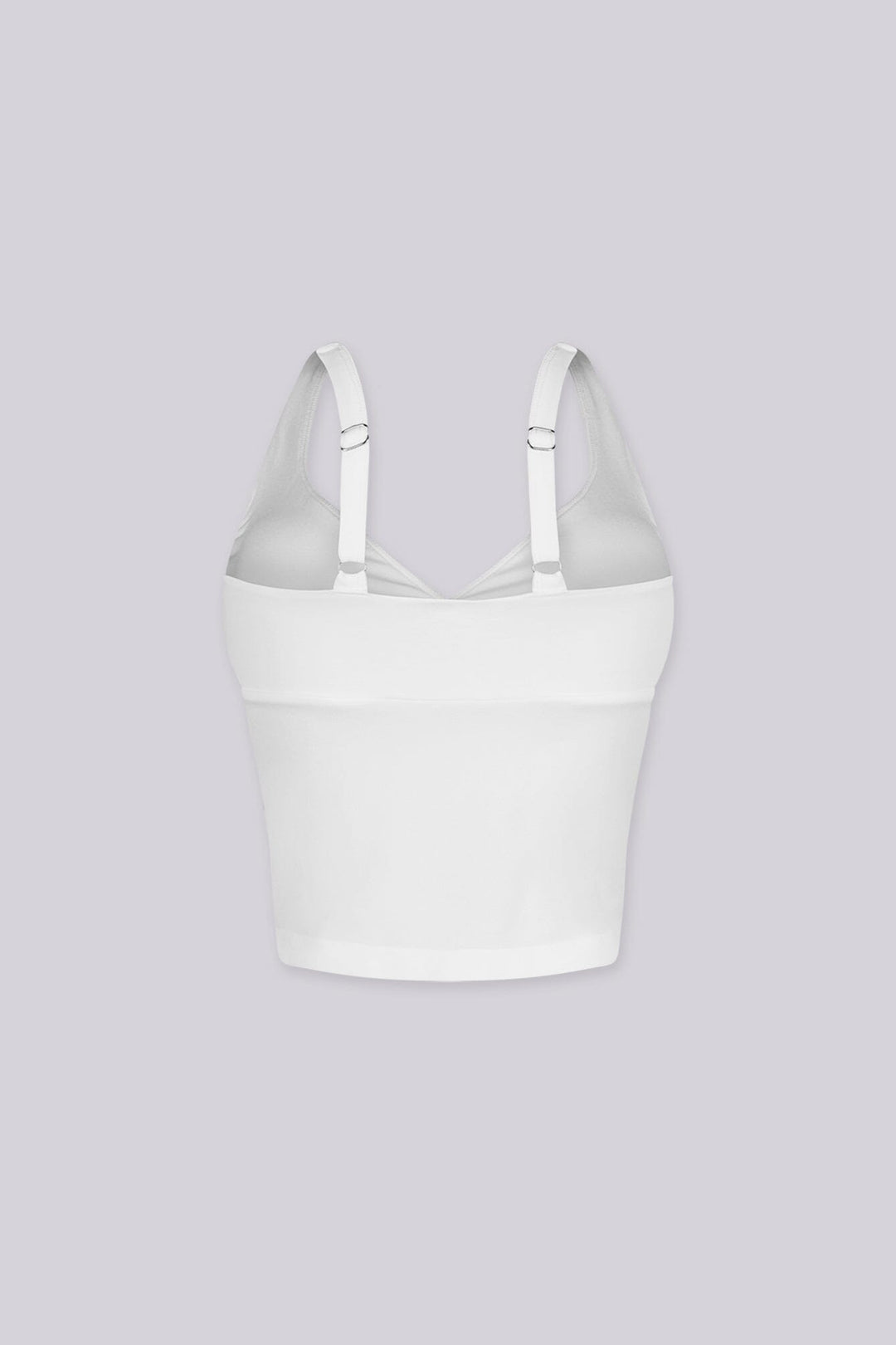 Cropped tank top featuring a flattering sweetheart neckline and padded bustier with adjustable straps