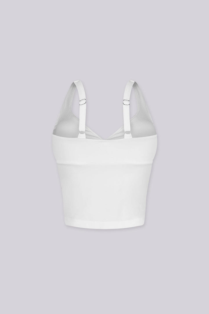 Cropped tank top featuring a flattering sweetheart neckline and padded bustier with adjustable straps