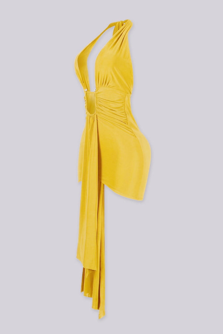 Plunging halter neckline mini dress with a long statement draping tail, Fitted ruched bodice gathers into a cinched waist with U shape hardware center front