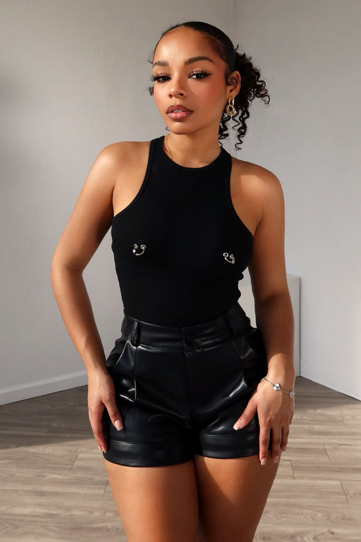 Ribbed high neck crop tank top with racerback featuring silver piercing detail on bust