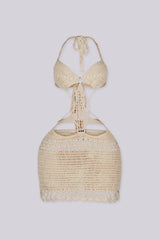 Crochet mini dress featuring a halter neckline and waist cutouts with an O ring detail