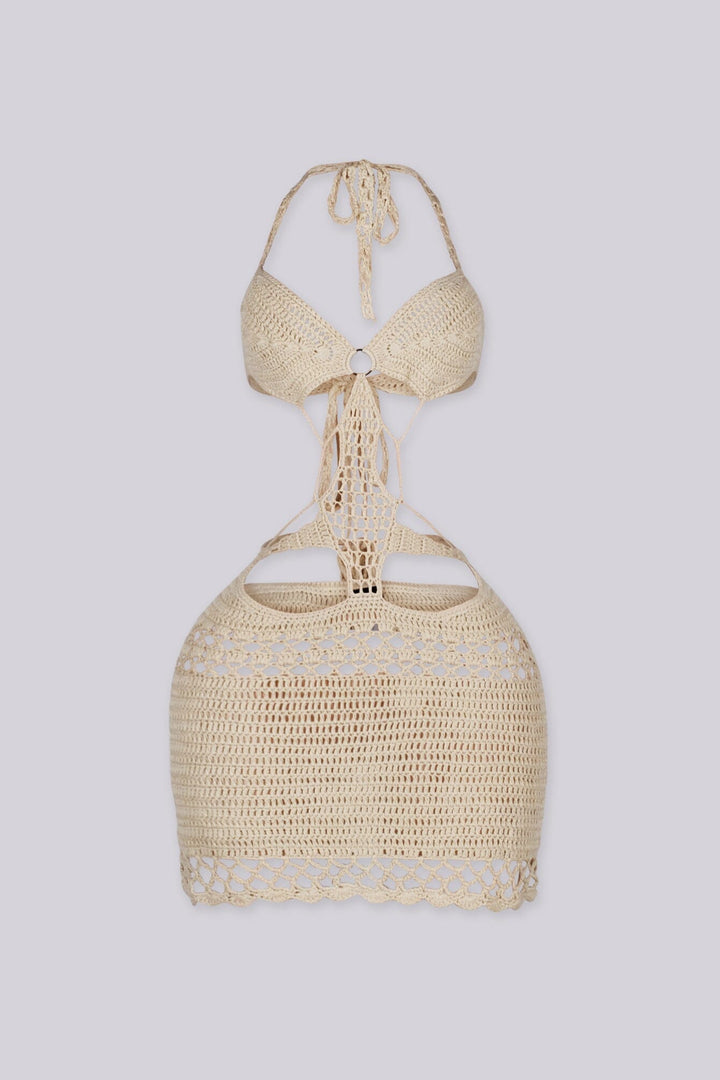 Crochet mini dress featuring a halter neckline and waist cutouts with an O ring detail