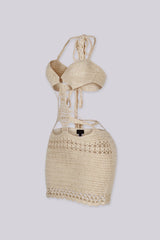 Crochet mini dress featuring a halter neckline and waist cutouts with an O ring detail